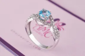 5mm Blue Topaz Twist Ring in Sterling Silver