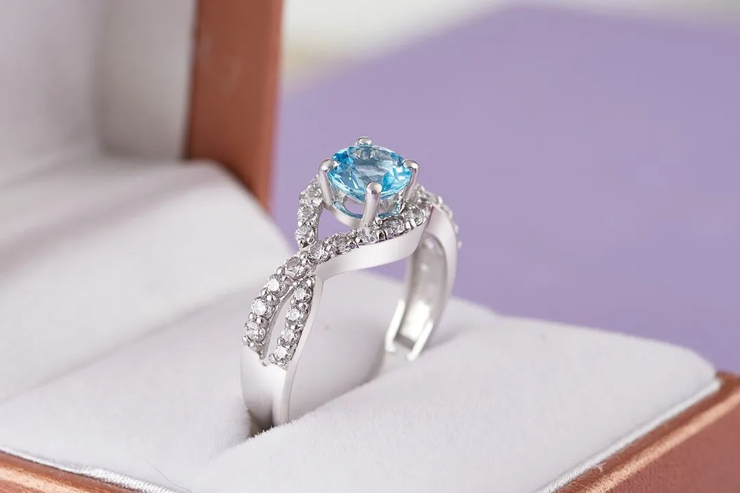 5mm Blue Topaz Twist Ring in Sterling Silver