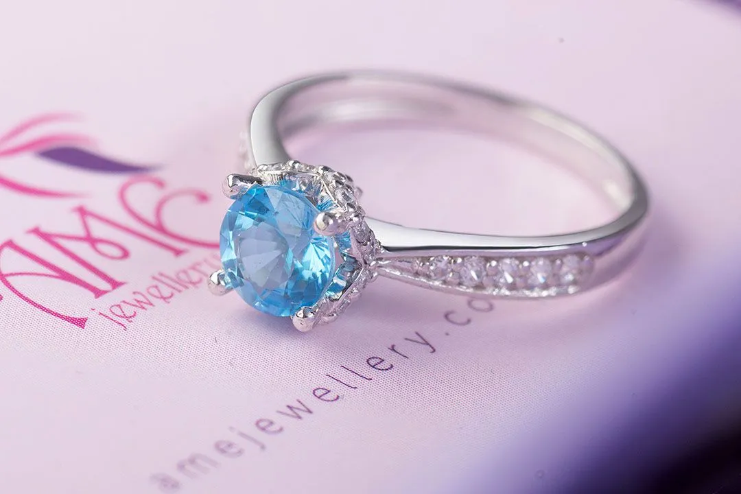 6mm Blue Topaz Flower Ring in Sterling Silver