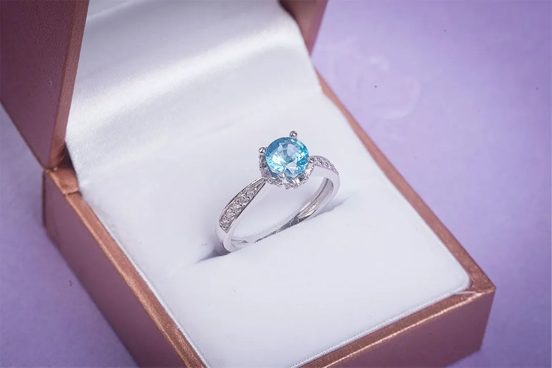 6mm Blue Topaz Flower Ring in Sterling Silver