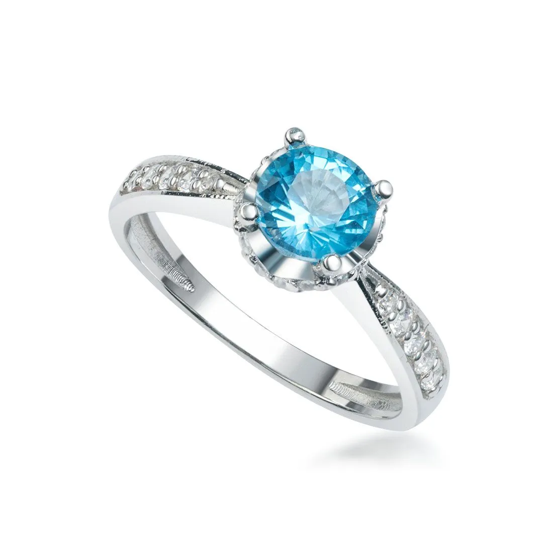 6mm Blue Topaz Flower Ring in Sterling Silver