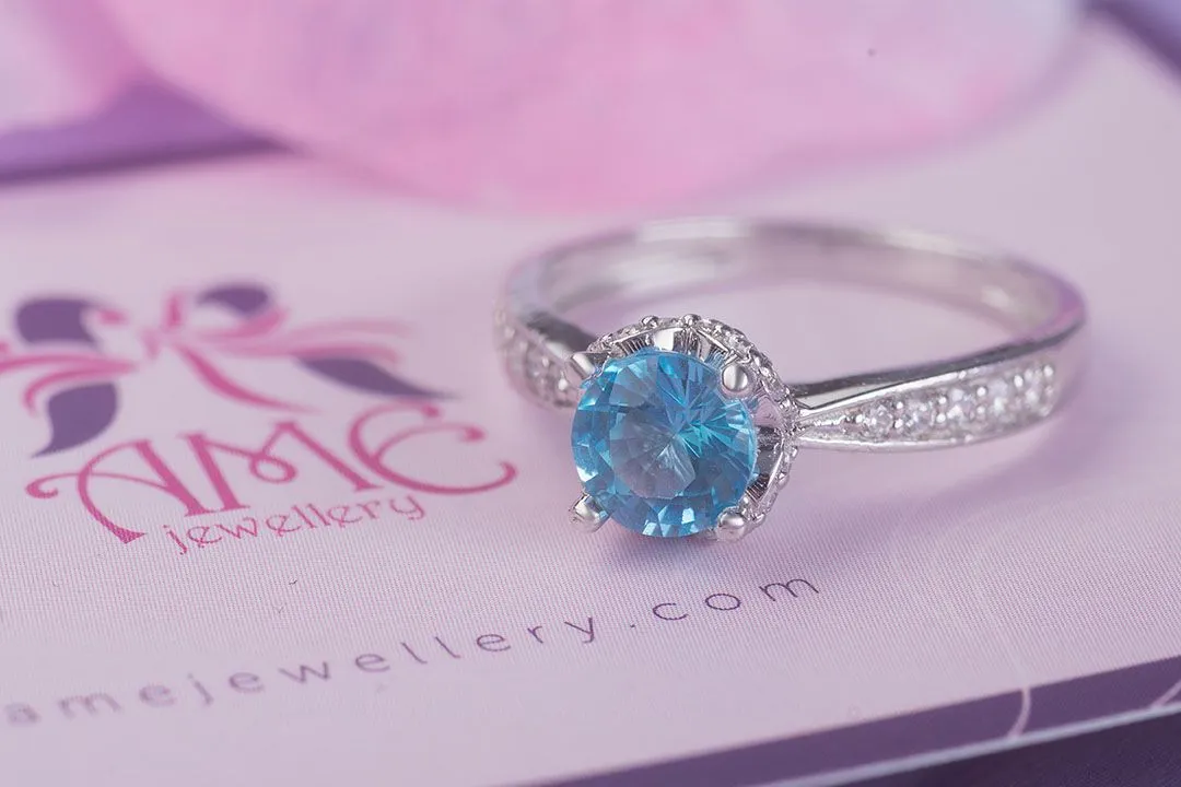 6mm Blue Topaz Flower Ring in Sterling Silver