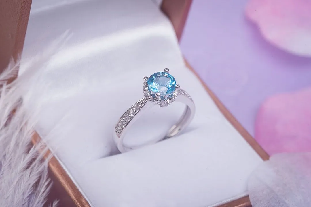 6mm Blue Topaz Flower Ring in Sterling Silver