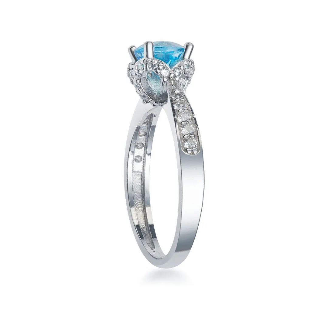 6mm Blue Topaz Flower Ring in Sterling Silver