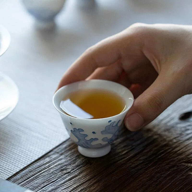Artisanal Jade Porcelain Tea Cup Set with Ocean Wave Design - 50ml Each