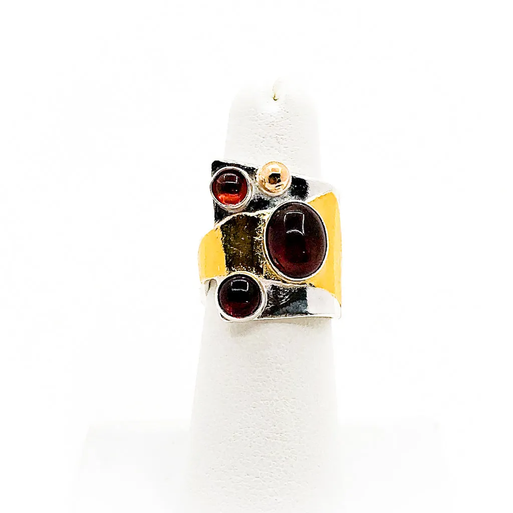 Sterling, 24k, and 14k Crotch Hugger Ring with Garnet