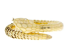 Yellow gold snake bracelet with diamond eyes and tail